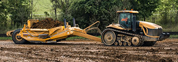 Side Profile of a K-Tex 122B tractor with a pull scraper